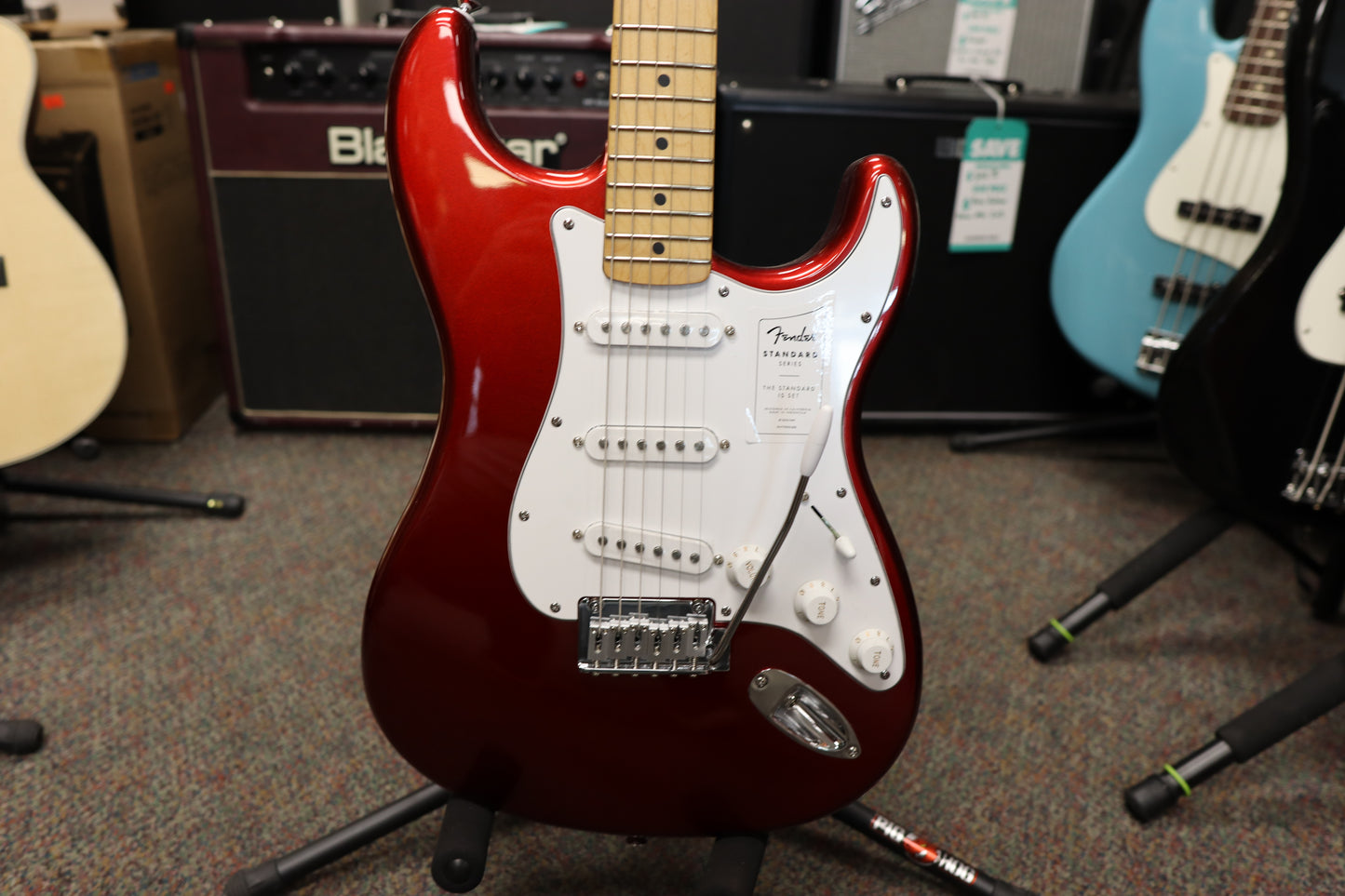 Fender Standard Stratocaster®, Maple Fingerboard, White Pickguard, Candy Cola