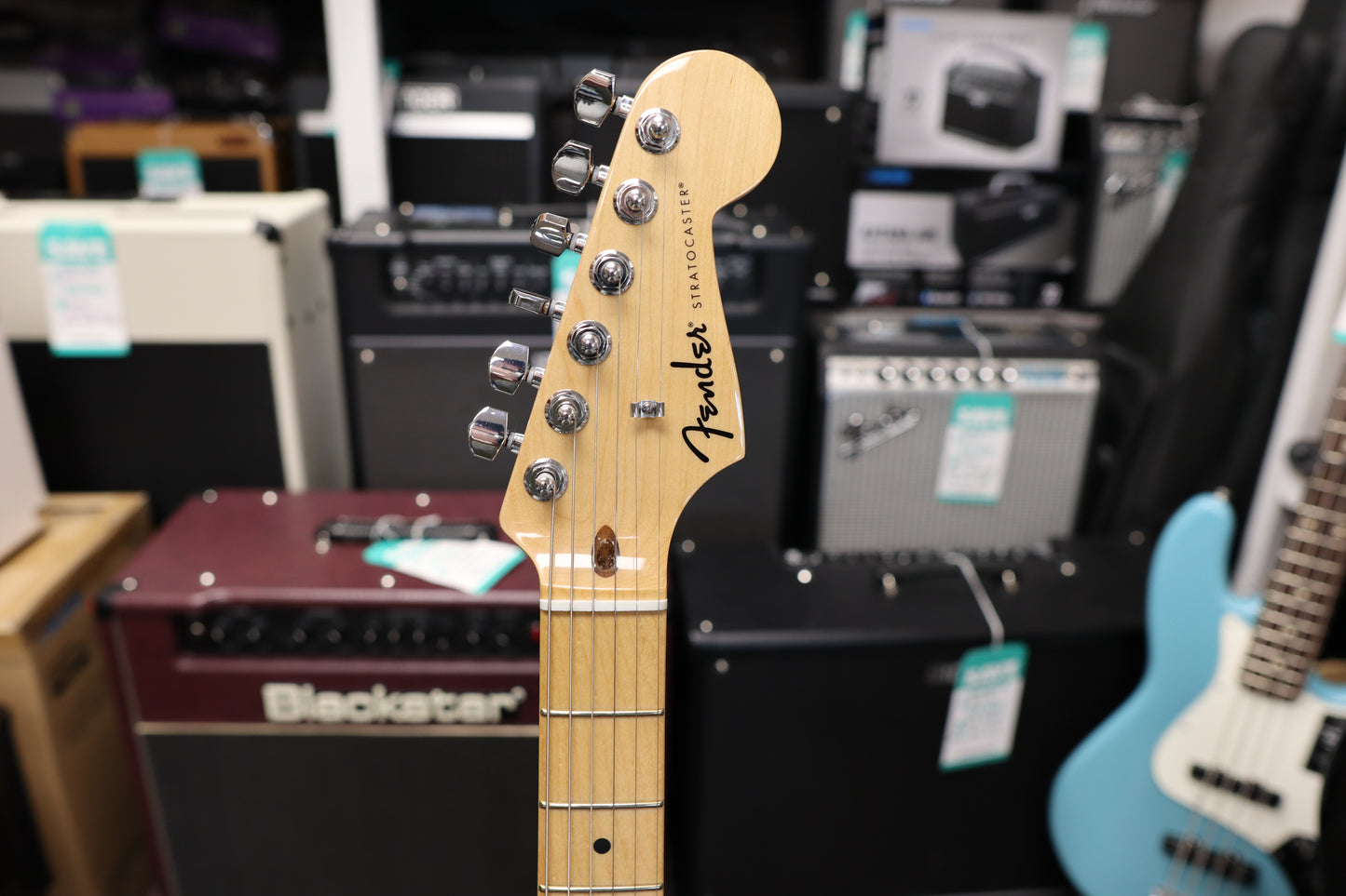 Fender Standard Stratocaster®, Maple Fingerboard, White Pickguard, Candy Cola