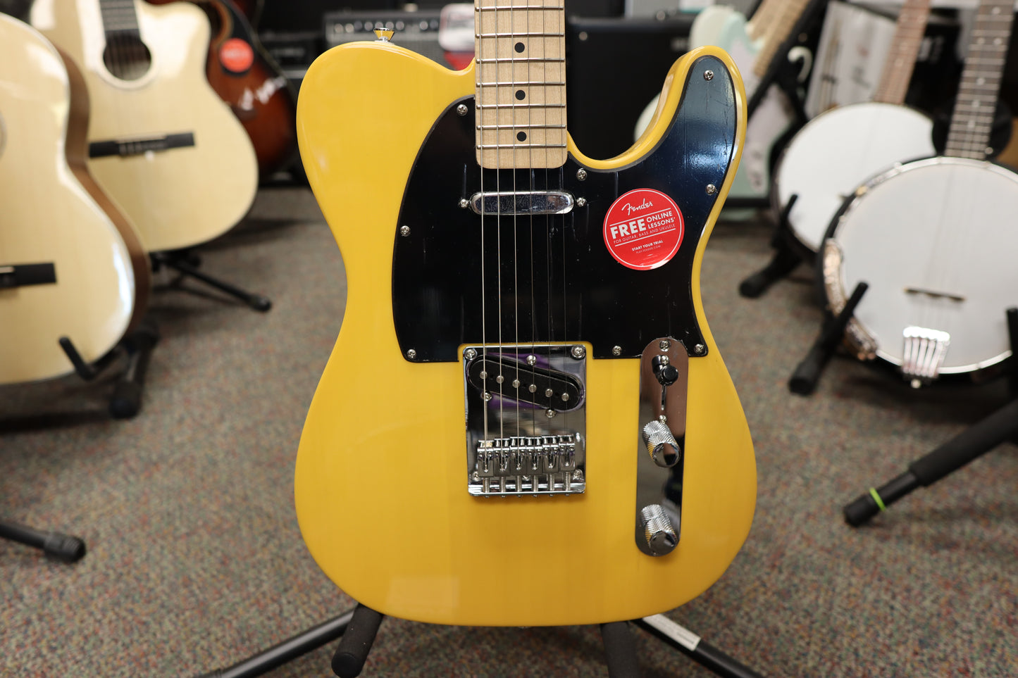 Squier Sonic® Telecaster®, Maple Fingerboard, Black Pickguard, Butterscotch Blonde