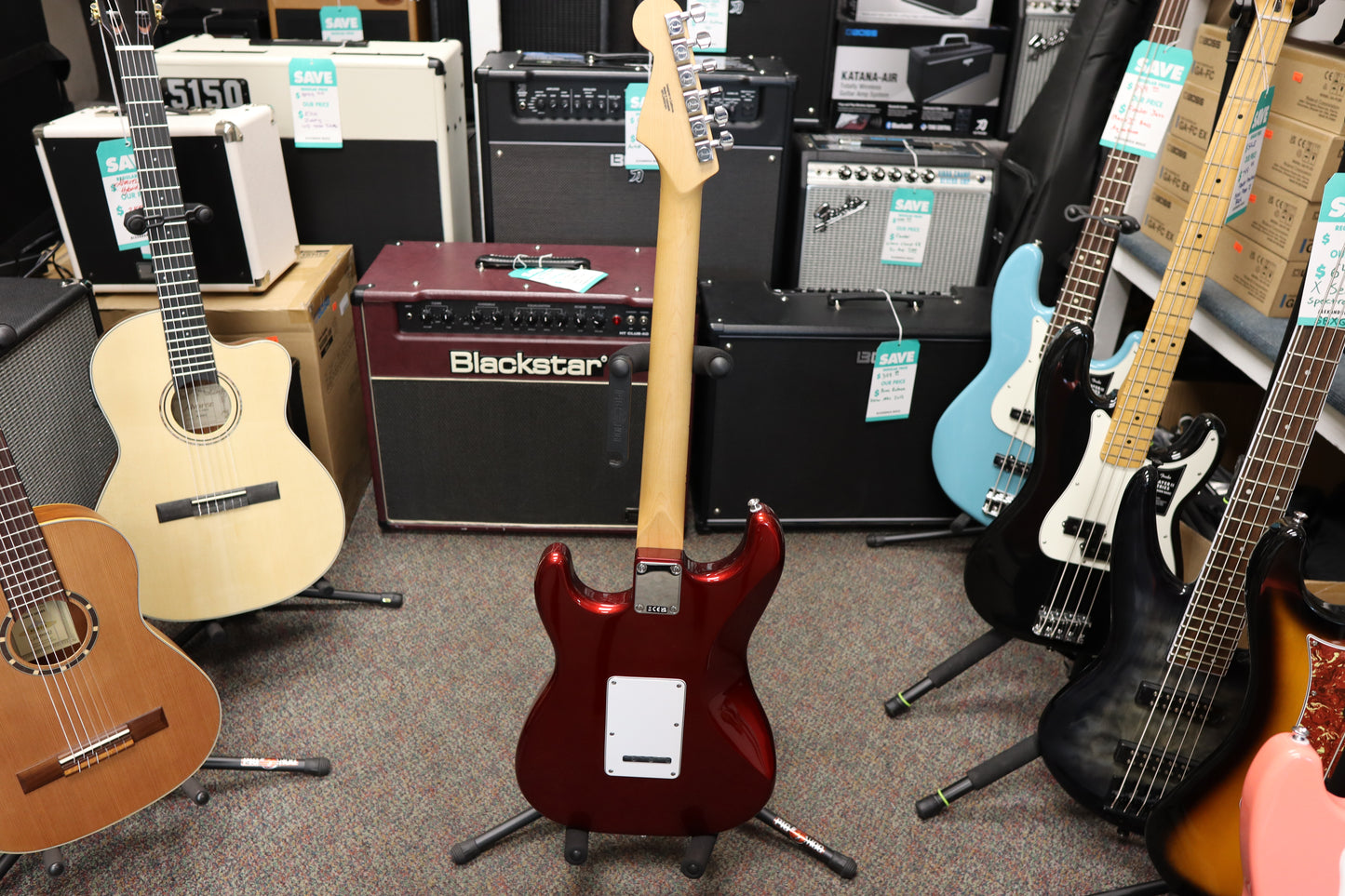 Fender Standard Stratocaster®, Maple Fingerboard, White Pickguard, Candy Cola