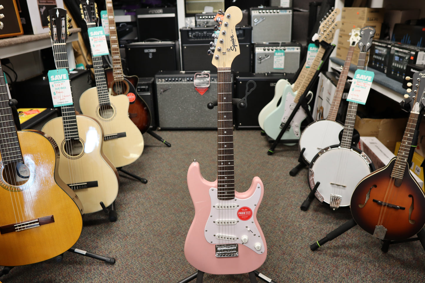Squier Mini Stratocaster®, Laurel Fingerboard, White Pickguard, Shell Pink
