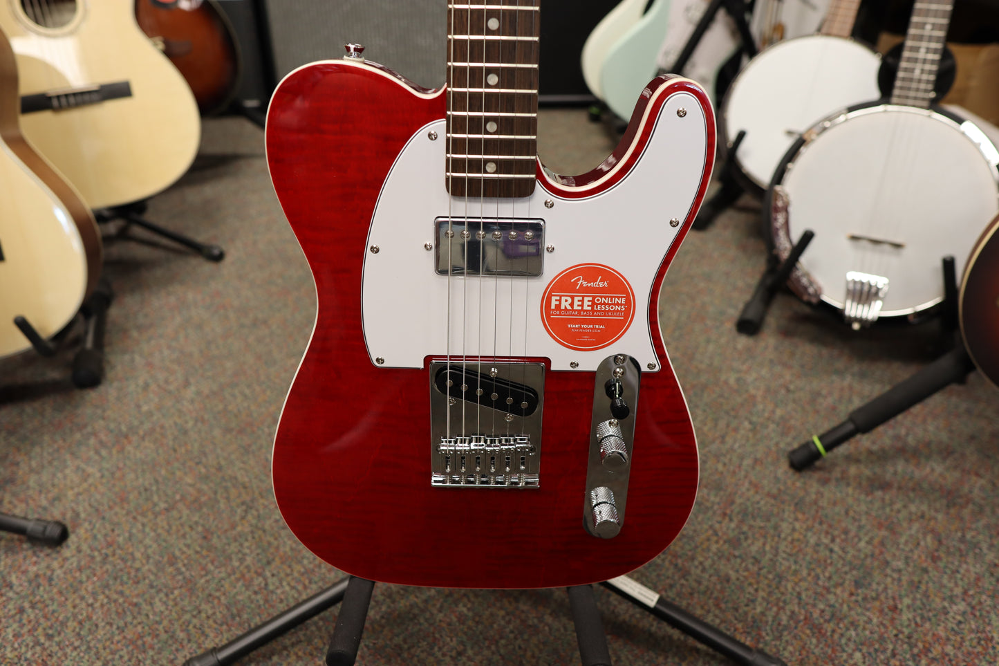 Squier Affinity Series® Telecaster® FMT SH, Laurel Fingerboard, White Pickguard, Crimson Red Transparent